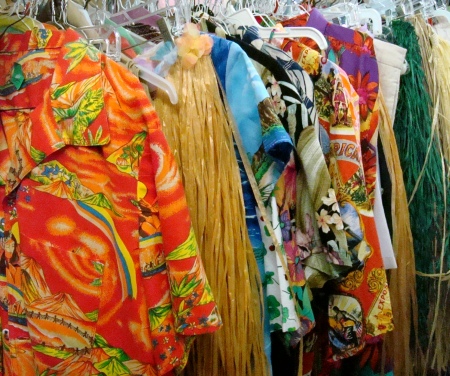 These Racks of Hawaiian Shirts, Hawaiian & Luau Costumes, Hawaiian Print Dresses, Hawaiian Wraps & Skirts, Hawaiian Leis, Grass Hula Skirts, Tropical Shirts, Tropical & Luau Costumes, Tropical Print Dresses, Tropical Wraps & Skirts, Tropical Leis, Tropical Hula Skirts are in stock now at Dallas Vintage Shop. 